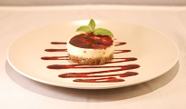 Cheesecake new-yorkais, coulis de myrtille